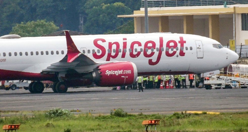 **EDS: RPT, ADDS DETAILS (FILE IMAGE FOR REPRESENTATION) ** New Delhi: In this Sunday, June 19, 2022 file image a Delhi-bound SpiceJet airplane following its emergency landing at Jai Prakash Narayan Airport in Patna. A SpiceJet aircraft operating from Delhi to Jabalpur had to return to the Delhi airport Saturday morning after the crew noticed smoke in its cabin while it was passing 5000ft. (PTI Photo)