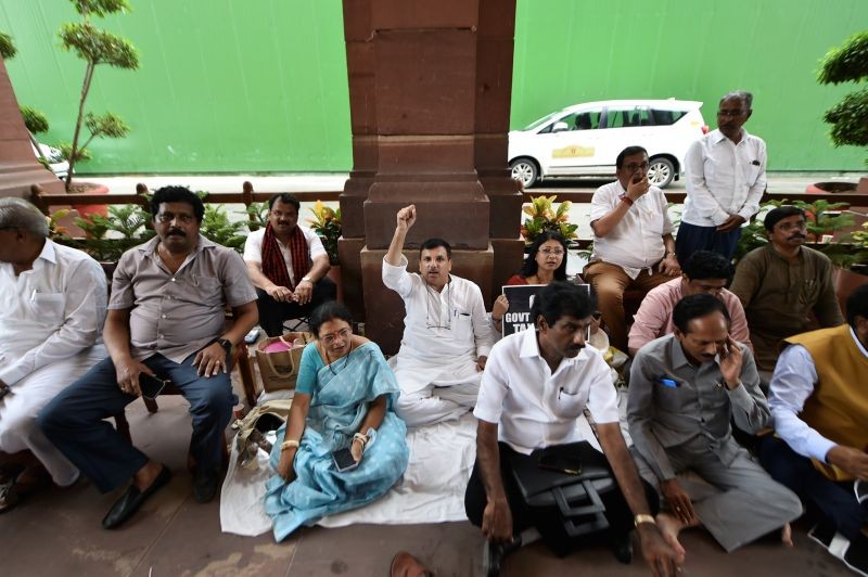 AAP MP Sanjay Singh and TMC MPs protest at Parliament House during ongoing Monsoon Session, in New Delhi, Thursday, July 28, 2022. (PTI Photo)