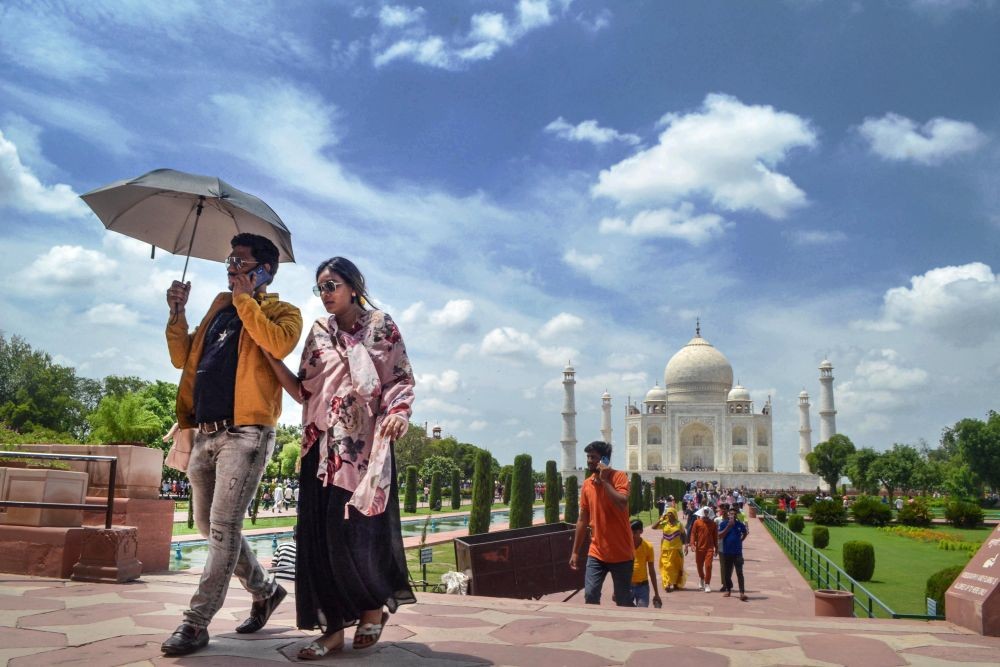 Agra: Tourists visit the Taj Mahal as clouds hover in the sky above the monument, in Agra, Saturday, July 2, 2022. (PTI Photo)