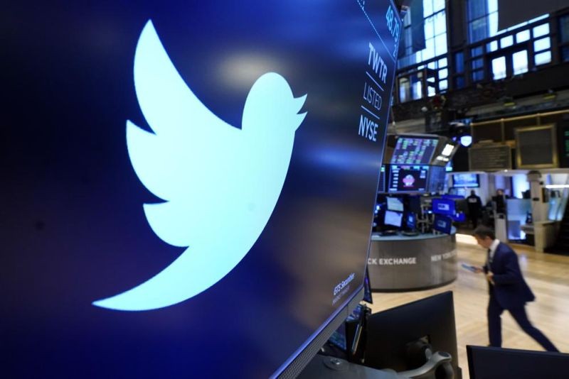 The logo for Twitter appears above a trading post on the floor of the New York Stock Exchange on Nov. 29, 2021. Twitter claims in a lawsuit filed on July 12, 2022, in Delaware, that Musk's “outlandish” and “bad faith” actions have caused the social media platform irreparable harm and sank its stock price. (AP File Photo)