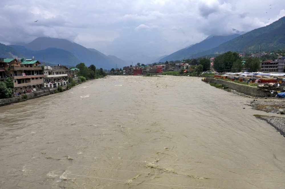 Kullu: Swollen Beas river following incessant monsoon rains, in Kullu district, Sunday, July 10, 2022. The district administration officials have instructed locals to stay away from all overflowing rivers and streams. (PTI Photo)