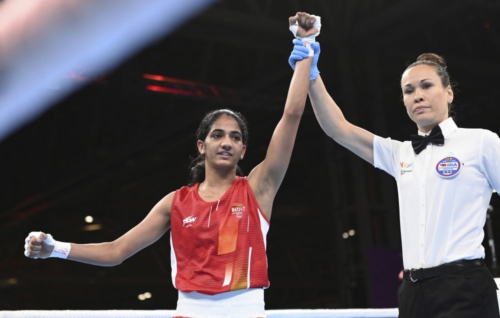 India's Nitu Nitu, left, celebrates after winning the Women's Minimum Weight quarter final boxing bout against Northern Ireland's Nicole Clyde at the Commonwealth Games in Birmingham, England, Wednesday, Aug. 3, 2022. AP/PTI