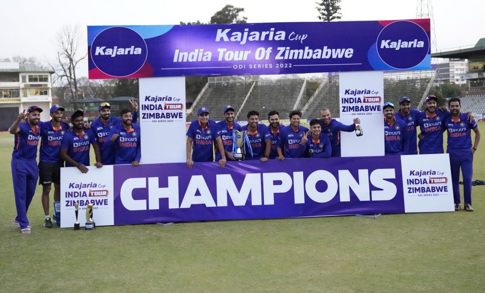 Indian cricket players pose for a photograph with the trophy after winning the series on the last day of the One-Day International cricket match between Zimbabwe and India at Harare Sports Club in Harare, Zimbabwe, Monday, Aug, 22, 2022. AP/PTI