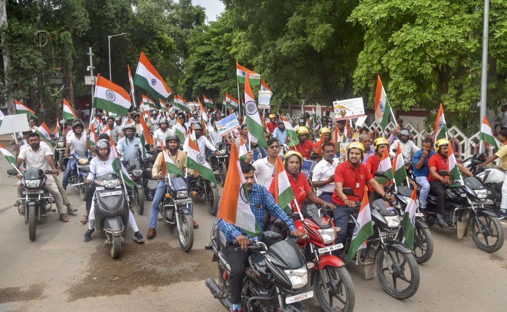 Varanasi: People take part in a Tiranga Yatra as part of Azadi Ka Amrit Mahotsav, in Varanasi, Thursday, Aug 11, 2022. (PTI Photo)
