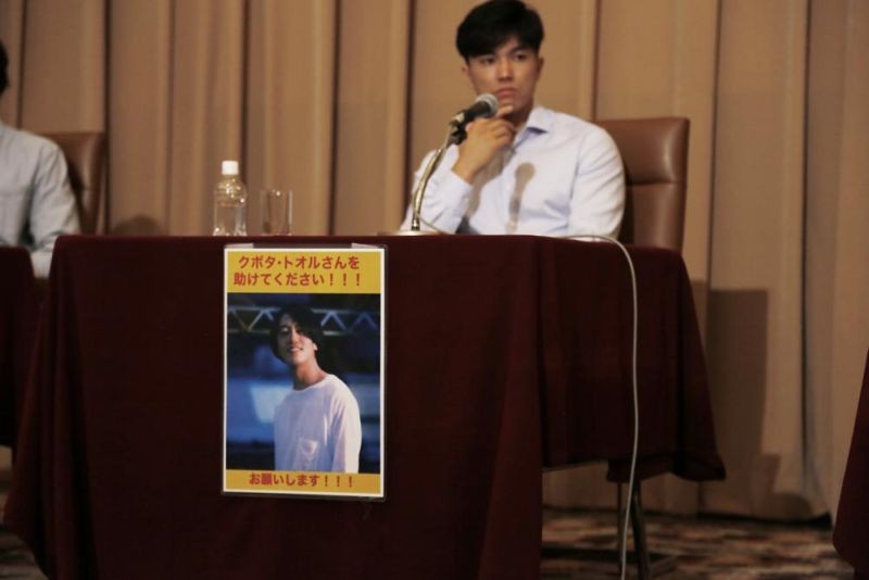 Images of Toru Kubota, a Japanese journalist detained in Myanmar while covering a protest, are displayed at the Japan Press Club in Tokyo, Wednesday, Aug. 3, 2022. Friends of Kubota gathered at the club calling for his immediate release. (AP Photo)
