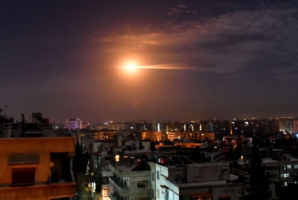 (190121) -- DAMASCUS, Jan. 21, 2019 (Xinhua) -- Syria's air defense missile, responding to a missile strike, is seen in the sky over Damascus, capital of Syria, on Jan.21, 2019. The Syrian air defenses responded to heavy Israeli strikes early Monday, destroying most of the missiles before they reached their targets, the Syrian state TV reported. (Xinhua/Ammar Safarjalani)