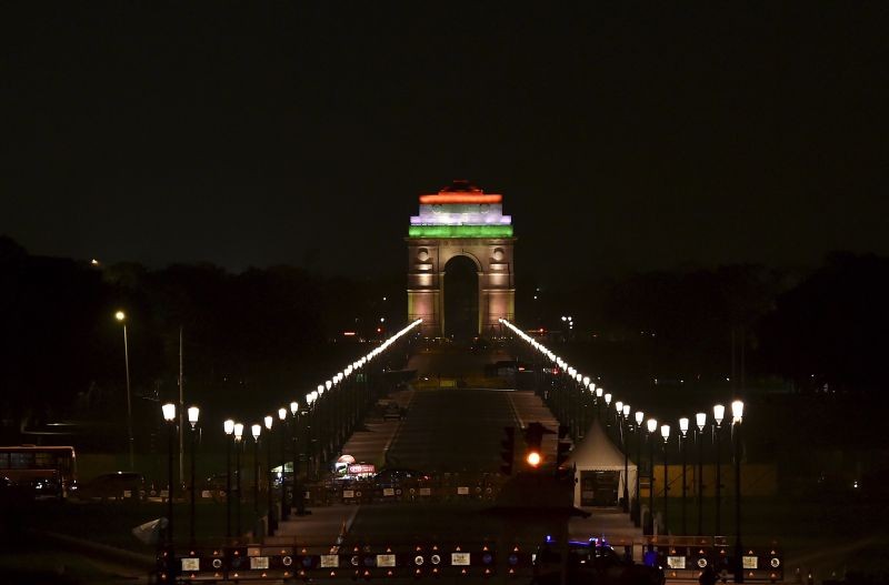 India Gate illuminated with tricolour lights as part of 'Azadi ka Amrit Mahotsav' celebrations, ahead of Independence Day, in New Delhi on August 13, 2022. (PTI Photo)