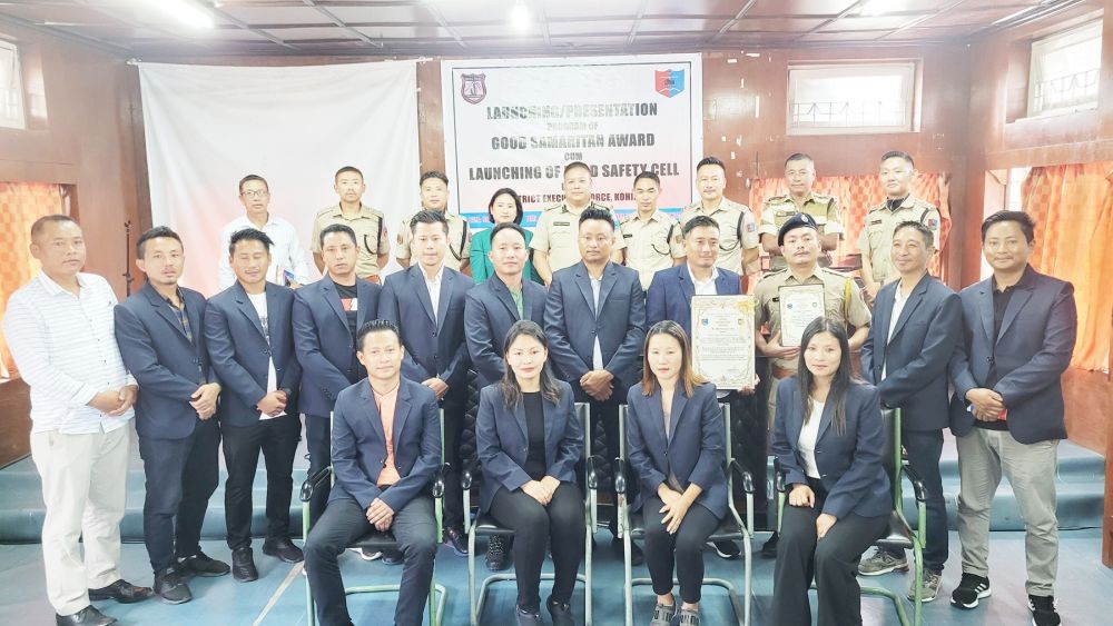 Kevithuto Sophie and other police officials with recipients of Good Samaritan Award in Kohima on August 9. (Morung Photo)