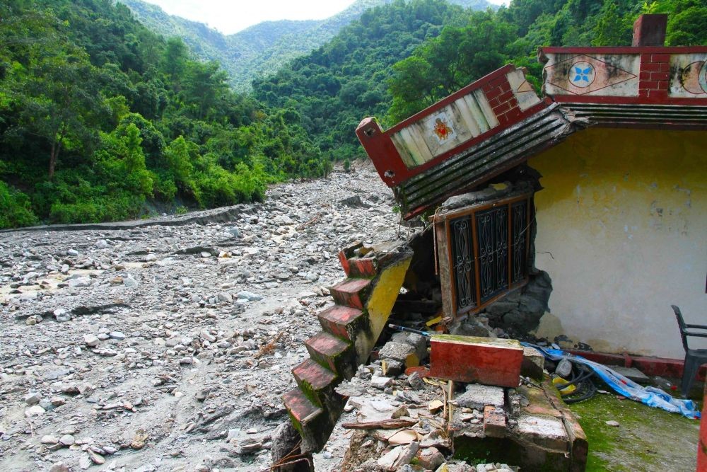 Tehri Garhwal: A house damaged after the cloudburst occurred yesterday, in Tehri Garhwal on Sunday, Aug 21, 2022. (Photo: Rameshwar Gaur/IANS)