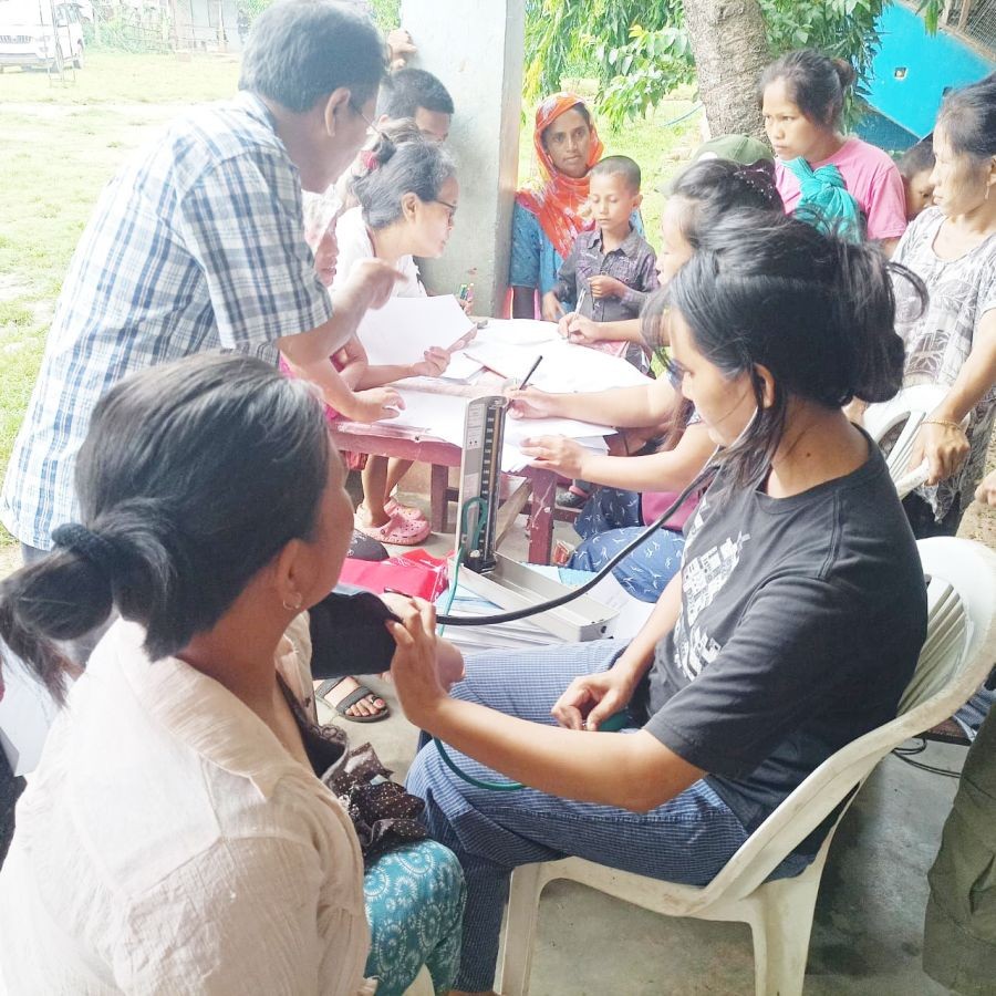 Patients being checked on during the health camp.