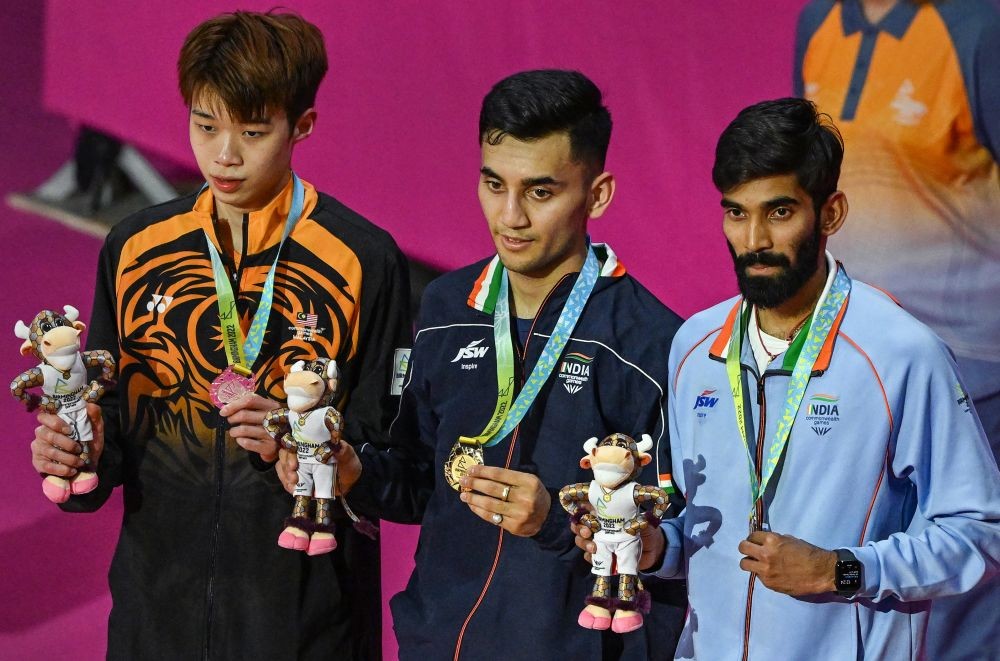 Birmingham: Gold medallist India's Lakshya Sen (C) with Silver medallist  Malaysia's Ng Tze Yong (L) and Bronze medallist India's Srikanth Kidambi, poses for photos at the presentation ceremony of the Men's Singles Badminton event at the Commonwealth Games 2022 (CWG), in Birmingham, UK, Monday, Aug. 8, 2022. (PTI Photo/Swapan Mahapatra)(