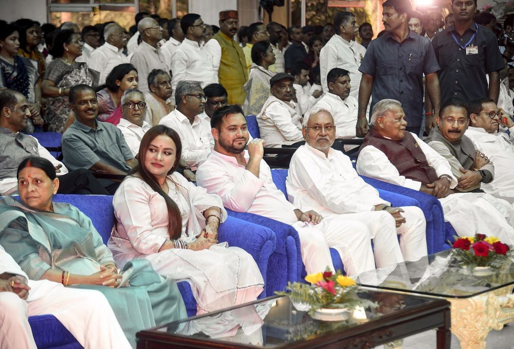 Patna: Bihar Chief MInister Nitish Kumar with Deputy CM Tejashwi Yadav and other leaders during the swearing-in ceremony at the Raj Bhavan, in Patna, Wednesday, Aug. 10, 2022. (PTI Photo)