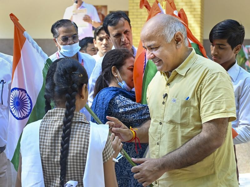 Delhi Deputy CM Manish Sisodia during a 'Har Ghar Tiranga' campaign ahead of Independence Day, at Govt. Sarvodaya Vidyalaya, in New Delhi. (PTI Photo)