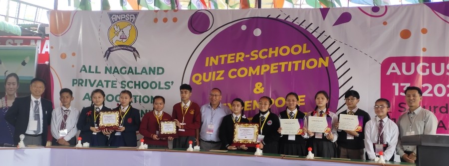 The winners along with dignitaries of the Inter-School Quiz & Extempore Competition.