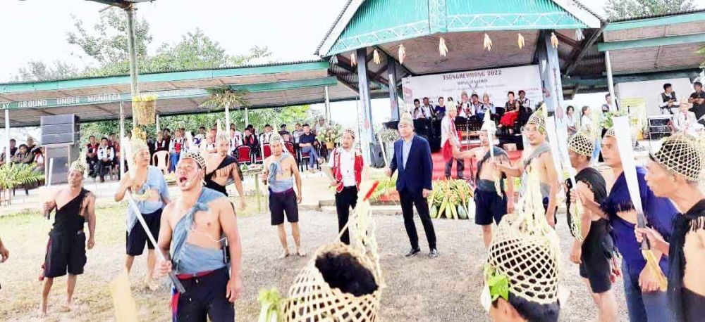 Minister Tongpang Ozukum and Advisor Medo Yhokha join the cultural troupe during Tsüngrenmong celebration in Mongsenyimti village on August 2.
