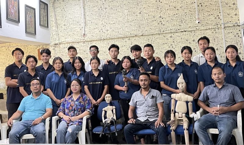 Jimmy Abraham Chishi with participants during the interactive session on ‘visual art and use of story telling objects’ was held in Patkai Christian College (Autonomous) on August 31.