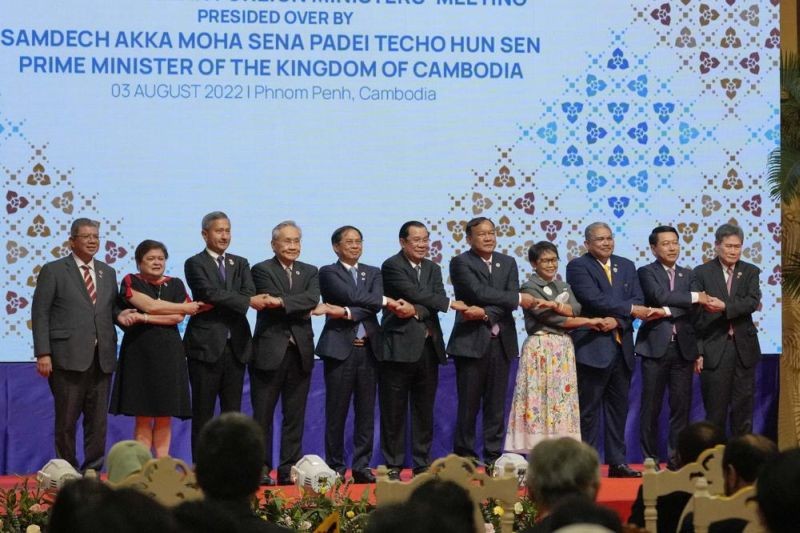 From left to right; Malaysian Foreign Minister Saifuddin Abdullah, Philippines Foreign Affairs acting Undersecretary Theresa Lazaro, Singapore Foreign Minister Vivian Balakrishnan, Thailand's Foreign Minister Don Pramudwinai, Vietnam Foreign Minister But Thanh Son, Cambodia's Prime Minister Hun Sen, Cambodia's Foreign Minister Peak Sokhonn, Indonesia's Foreign Minister Retno Marsudi, Brunei Second Minister of Foreign Affairs Erywan Yusof, Laos Foreign Minister Saleumxay Kommasith, and Secretary-General of ASEAN Lim Jock Hoi poses for a group photograph during the opening for the 55th ASEAN Foreign Ministers' Meeting (55th AMM) in Phnom Penh, Cambodia, Wednesday, Aug. 3, 2022. Southeast Asian foreign ministers are gathering in the Cambodian capital for meetings addressing persisting violence in Myanmar and other issues, joined by top diplomats from the United States, China, Russia and other world powers amid tensions over the invasion of Ukraine and concerns over Beijing's growing ambitions in the region. (AP Photo)