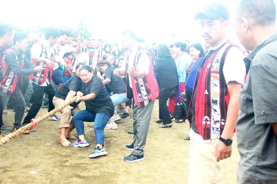 The 27 Mokokchung Town A/C celebrated Tsüngremmung festival at Multi-Sports Complex, Mokokchung on August 2. The festival was hosted by Minister RD Metsubo Jamir. In his address, Jamir urged the Ward authority leaders to have the humility to accept criticism and to become more humble as they discharged their duties and responsibility to the people they served. Short speeches were also delivered by Aongza Ward, Kichutip Ward, Salangtem Ward, Mongsenbai Ward, Kumlong Ward and others. Celebration was marked with a tug-war competition for both men and women and community feast.