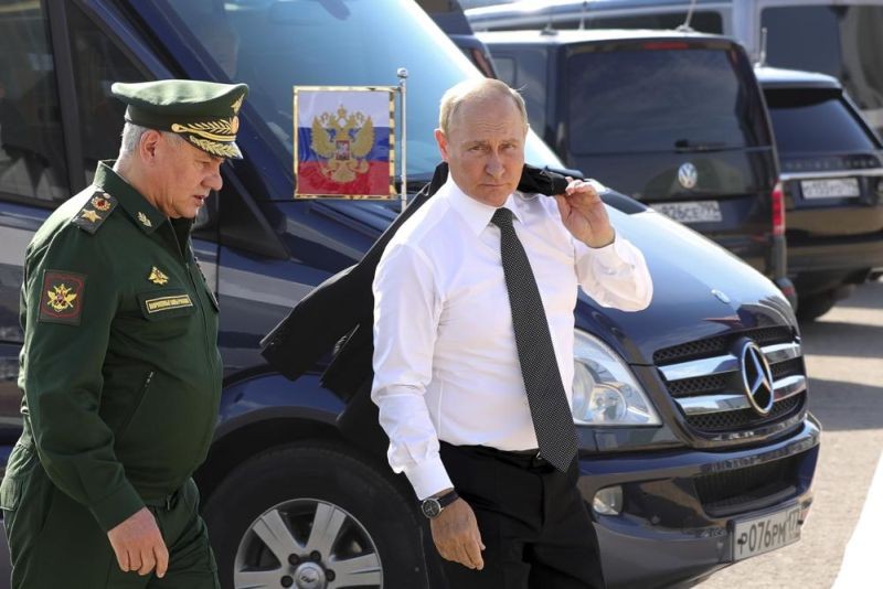 Russia's President Vladimir Putin and Russian Defense Minister Sergei Shoigu arrive to attend the opening of the Army 2022 International Military and Technical Forum in the Patriot Park outside Moscow, Russia, Monday, Aug. 15, 2022. Putin vowed to strengthen Russia's military cooperation with its allies. (AP Photo)