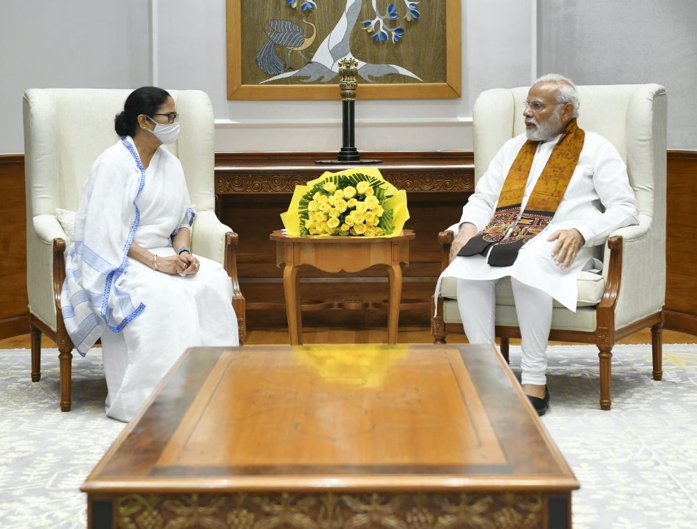 **EDS: TWITTER IMAGE POSTED BY @PMO ON FRIDAY, AUG. 5, 2022** New Delhi: Prime Minister Narendra Modi with West Bengal CM Mamata Banerjee during a meeting in New Delhi. (PTI Photo)