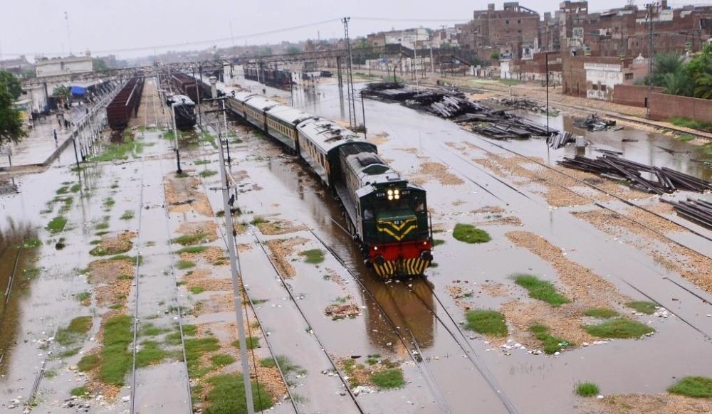 A train arrives at a railway station in Hyderabad, Pakistan, on Aug. 18, 2022. (Str/Xinhua)