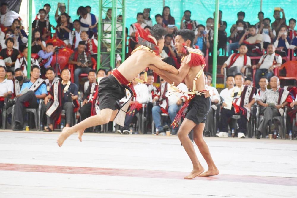Members of a student body performing during the Tsüngremmung programme in Ungma on August 1. (Morung Photo)