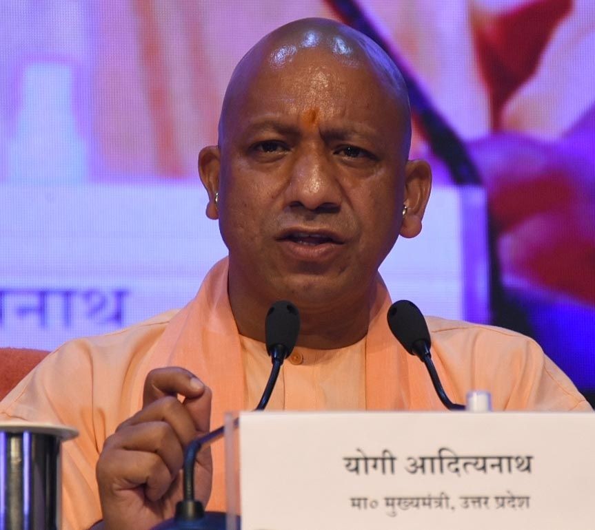 LUCKNOW :Uttar Pradesh Chief Minister Yogi Adityanath addresses a press conference on the completion of 100 days of his government in his second tenure at Lok Bhawan in Lucknow on Monday July 04,2022.(PHOTO:IANS/Phool Chandra)