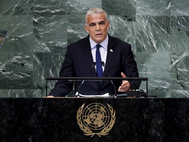 Prime Minister Yair Lapid addresses the 77th session of the United Nations General Assembly at the UN headquarters in New York City on September 22, 2022. Lapid says any deal would be conditional on a peaceful Palestine. (AP Photo)