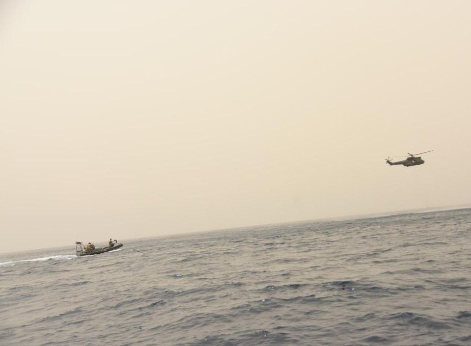 Lebanese military ship and helicopter search for bodies at sea in Tripoli, Lebanon, on April 24, 2022. The Lebanese army on Sunday rescued 45 people and recovered eight bodies after a migrant boat sunk in the waters off the northern city of Tripoli. The Lebanese army said at a press conference that high waves submerged the overloaded boat, which carried more than 50 people. (Photo by Khaled Habashiti/Xinhua/IANS)
