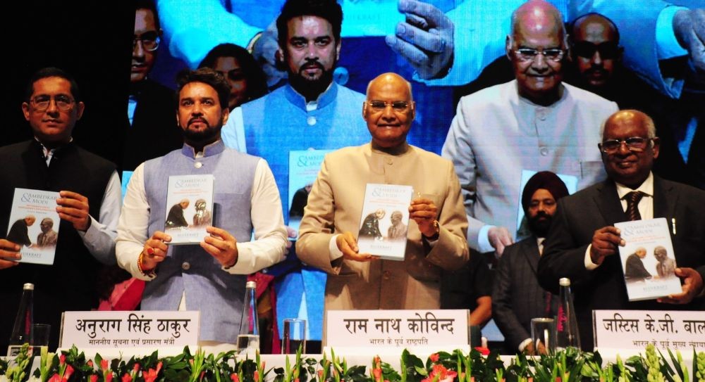 New Delhi: Former President Ram Nath Kovind, Union Minister Anurag Thakur, former CJI justice KG Balakrishnan and others launch a book 'Ambedkar and Modi- Reformers Ideas Performers Implementation', in New Delhi on Friday, Sept. 16, 2022. (Photo: Qamar Sibtain/IANS)