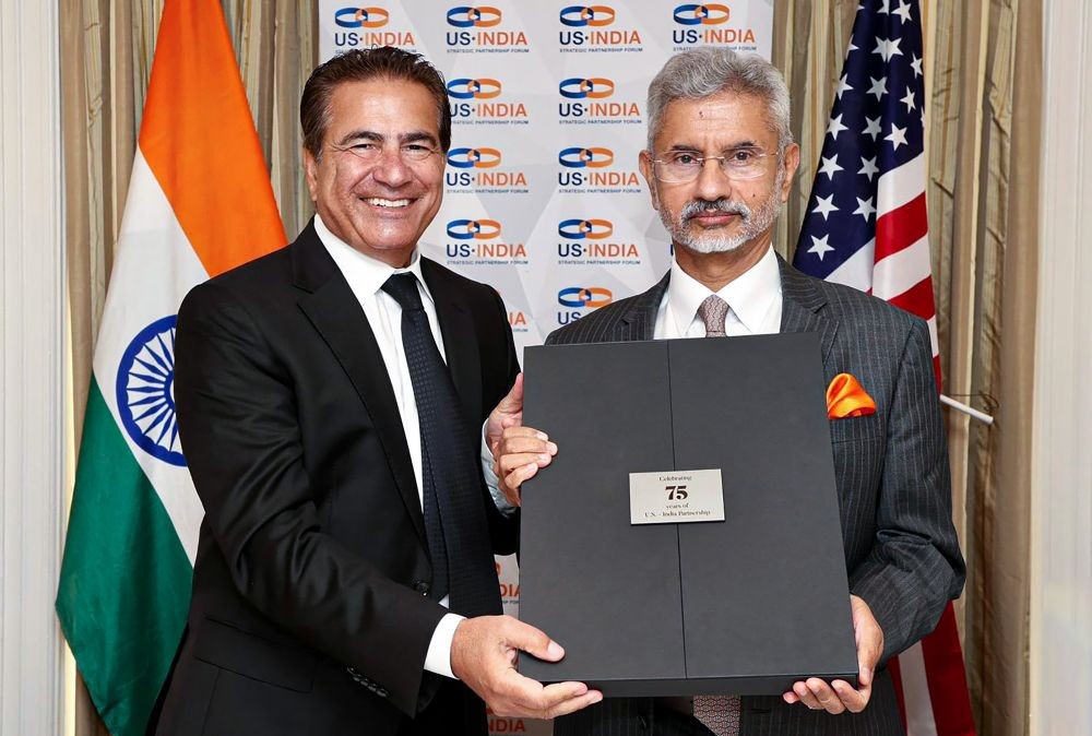 **EDS: IMAGE VIA @DrSJaishankar ON THURSDAY, SEPT. 29, 2022** Washington DC: External Affairs Minister S Jaishankar receives a coffee table book from President and CEO, USISP Forum Mukesh Aghi during a business luncheon with US-India Strategic Partnership Forum Board members. (PTI Photo) (PTI09_29_2022_000013B)
