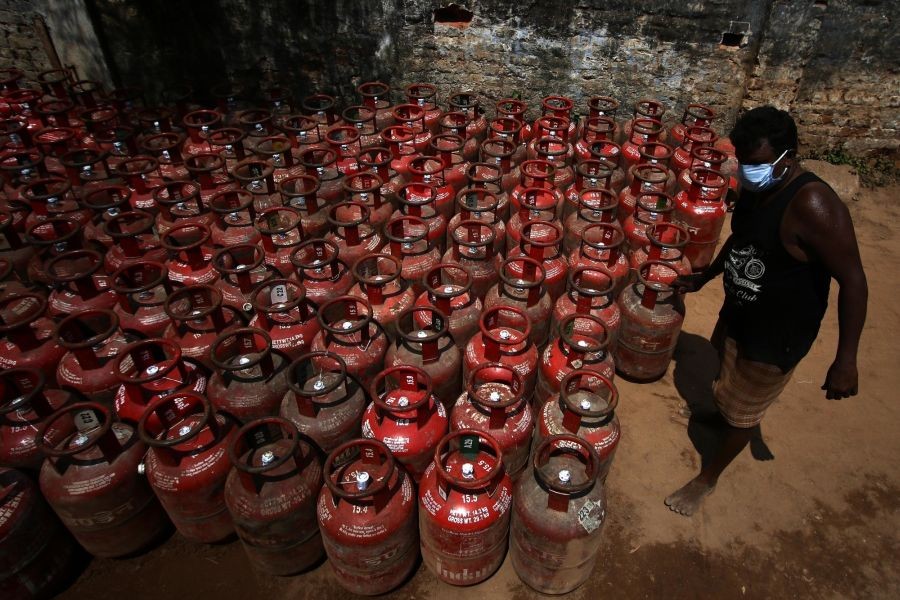 Chennai: A worker busy arranging LPG Gas cylinders at a godown on Day 2 of the 21-day nationwide lockdown imposed by the Narendra Modi government over the coronavirus pandemic; in Chennai on March 26, 2020. (Photo: IANS)
