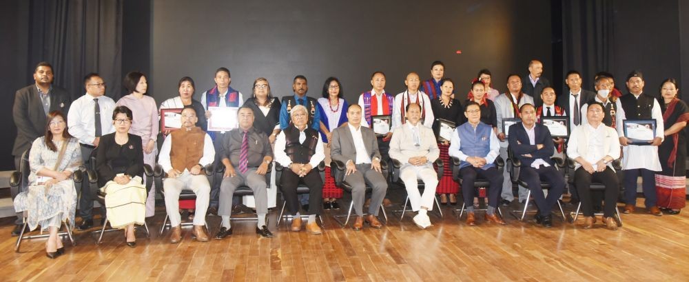 Chief Minister Neiphiu Rio and others with recipients of state level teachers’ award 2022 in Kohima on September 5. (Morung Photo)