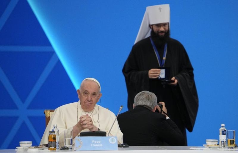 Pope Francis and Metropolitan Anthony, in charge of foreign relations for the Russian Orthodox Church, attend the '7th Congress of Leaders of World and Traditional Religions, in Nur-Sultan, Kazakhstan, Wednesday, Sep. 14, 2022. Against the backdrop of Russia's invasion of Ukraine, Francis opened an interfaith conference in the former Soviet republic of Kazakhstan by challenging delegations to unite in condemning war. (AP Photo)