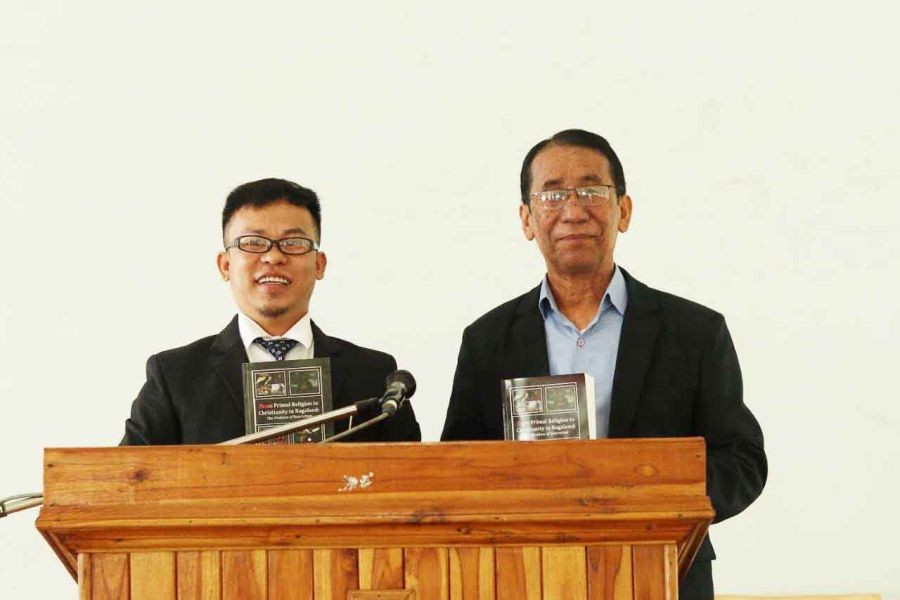 Dr. Ruokuozelie Pienyü (L) with Rev. Dr. Visielie Angami during his book launch on Tuesday in Kohima. (Photo Courtesy: FTS)
