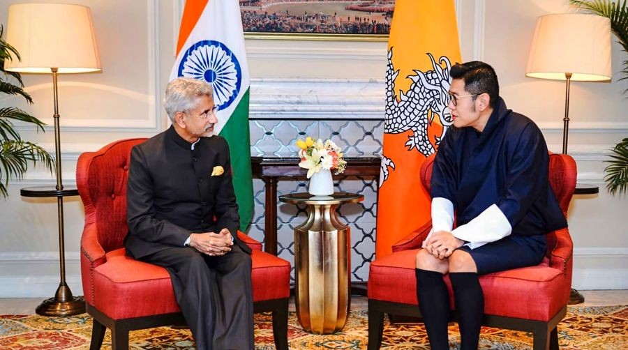 **EDS: TWITTER IMAGE POSTED BY @DrSJaishankar ON THURSDAY, SEPT. 15, 2022** New Delhi: External Affairs Minister S. Jaishankar interacts with King of Bhutan Jigme Khesar Namgyel Wangchuck during a meeting, in New Delhi. (PTI Photo)