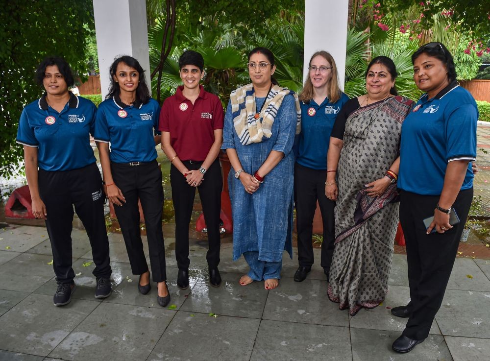 New Delhi: Union Women and Child Development Minister Smriti Irani meets with Lady Umpires and officials of the Legends League cricket as part of the women's empowerment and 'Beti Bachao Andolan', at her residence in New Delhi, Saturday, Sep 24, 2022. (PTI Photo/Manvender Vashist Lav)