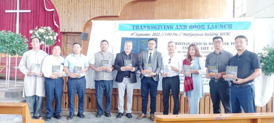M Rollan Lotha, Chief Operating Officer (COO) Nagaland State Rural Livelihood Mission, Government of Nagaland seen with the author Dr O James Kithan during the thanksgiving and book launching programme at Wokha Village Baptist Church on September 10.