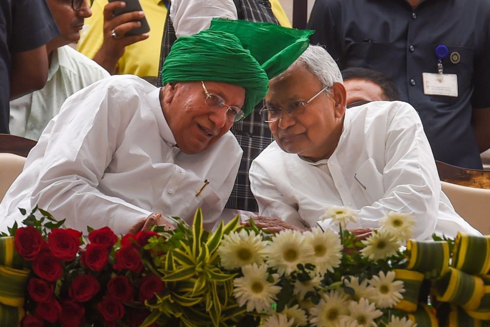 Fatehabad: Indian National Lok Dal (INLD) chief OP Chautala interacts with Bihar CM and JD(U) leader Nitish Kumar during a rally organised on the occasion of 109th birth anniversary of former deputy PM Devi Lal, in Fatehabad, Sunday, Sept. 25, 2022. (PTI Photo/Atul Yadav) (