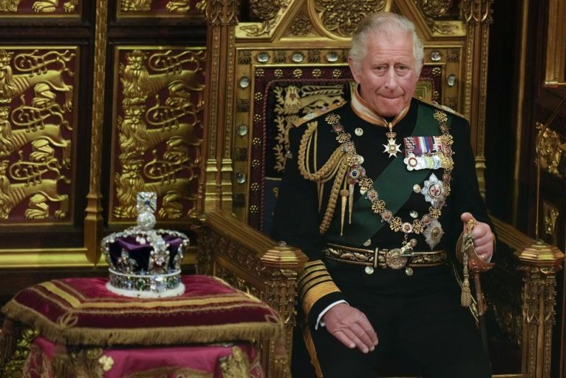 Prince Charles is seated next to the Queen's crown during the State Opening of Parliament, at the Palace of Westminster in London, May 10, 2022. Queen Elizabeth II did not attend the opening of Parliament amid ongoing mobility issues. Prince Charles has been preparing for the crown his entire life. Now, that moment has finally arrived. Charles, the oldest person to ever assume the British throne, became king on Thursday Sept. 8, 2022, following the death of his mother, Queen Elizabeth II. (AP File Photo)