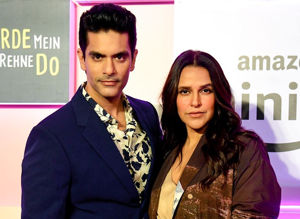 Mumbai: Bollywood actors Neha Dhupia and Angad Bedi pose for photographs during the Amazon MiniTV Mini Movie Festival, in Mumbai, Thursday night, Sept. 22, 2022. (PTI Photo)