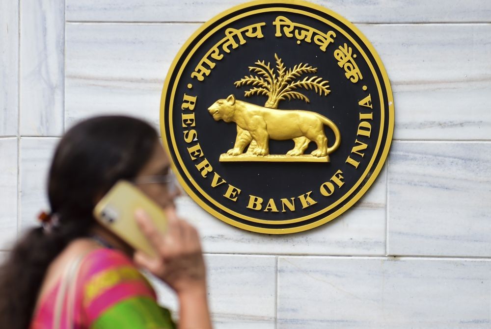 Mumbai: A woman walks past the Reserve Bank of India (RBI) headquarters, in Mumbai, Friday, Sept. 30, 2022. (PTI Photo/Shashank Parade)