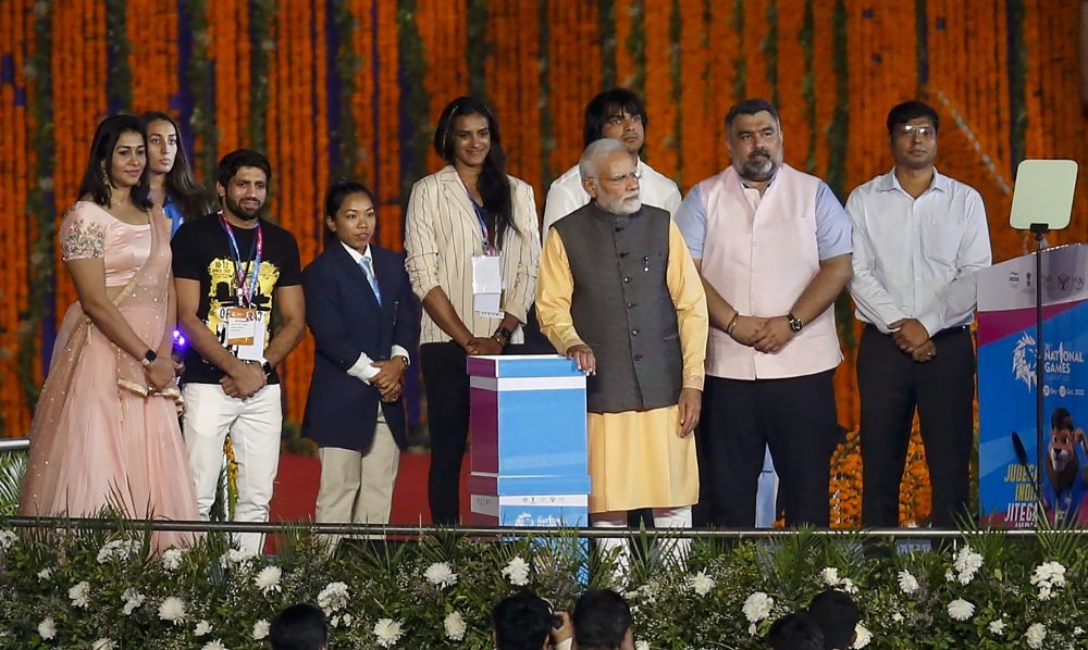 Ahmedabad: Prime Minister Narendra Modi with PV Sindhu, Neeraj Chopra, Meerabai Chanu and other sportspersons during inauguration of 36th National Games in Ahmedabad, Thursday, Sept. 29, 2022. (PTI Photo)