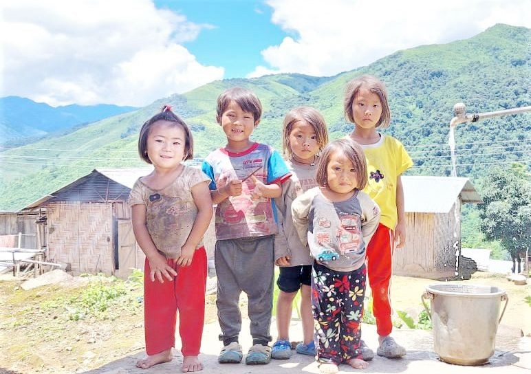 Children stand near a running tap water connection somewhere in Nagaland. (Photo Courtesy: Twitter@Jal Jeevan Mission Nagaland PHED)