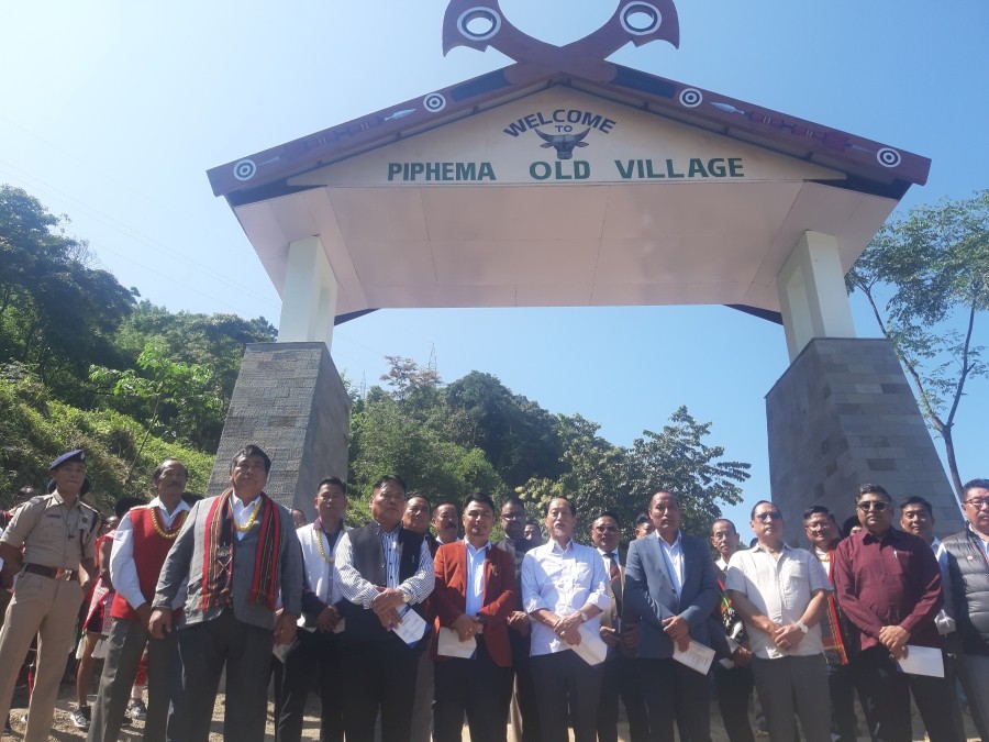 Neiphiu Rio and others during the inauguration of traditional gate at Piphema Old on October 21.
