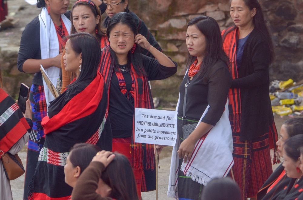 A section of attendees holding placards demanding Statehood during a public rally for Frontier Nagaland organised by Eastern Nagaland Women Organisation ENWO or at Parade Ground in Tuensang on October 25. (Morung Photo)