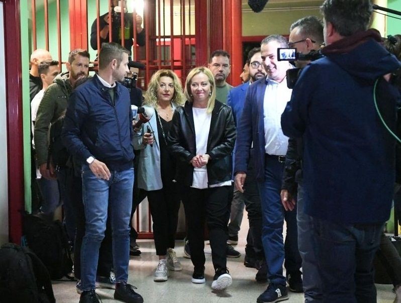 Giorgia Meloni (C), leader of the Brothers of Italy party, arrives at a polling station in Rome, Italy, Sept. 25, 2022. (Xinhua/Jin Mamengni/IANS)