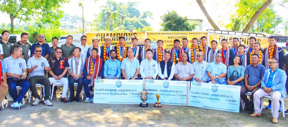 Nagaland Under-17 team of the 61st Subroto Cup International Football Tournament with others upon their arrival to the State after winning the trophy at Dimapur Airport on October 15.