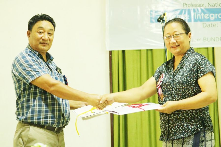 Patkai Christian College (Autonomous), Principal Dr Thepfuvilie Pierü and Dr Themrichon Tuithung, Professor Department of Computer Science and Engineering National Institute of Technology, Nagaland exchange the MoU signed between the two institutions on October 7.