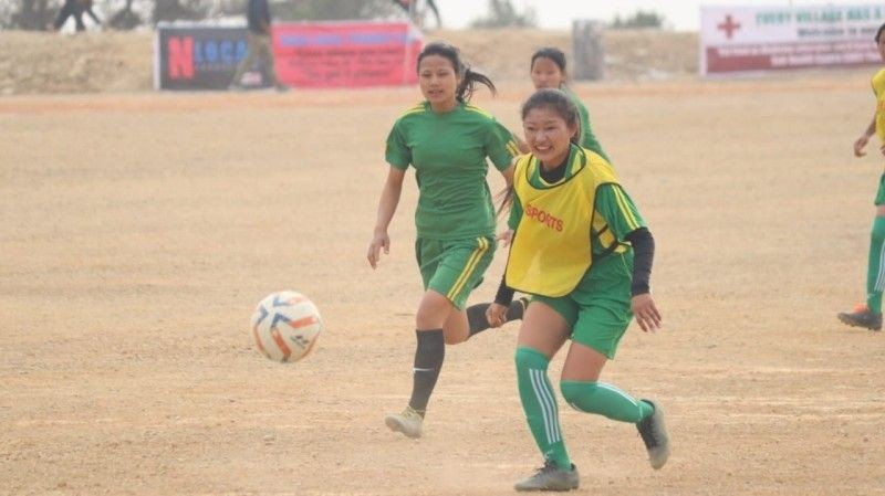 Womenâ€˜s football match in progress on the second day of the 36th Phek District Sports Association (PDSA) Meet in Thenyizu village on March 24, 2021. It is rare event where womenâ€™s football competition is featured. (Morung Photo)